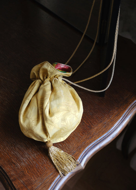 GILDED PETAL BUCKET BAG